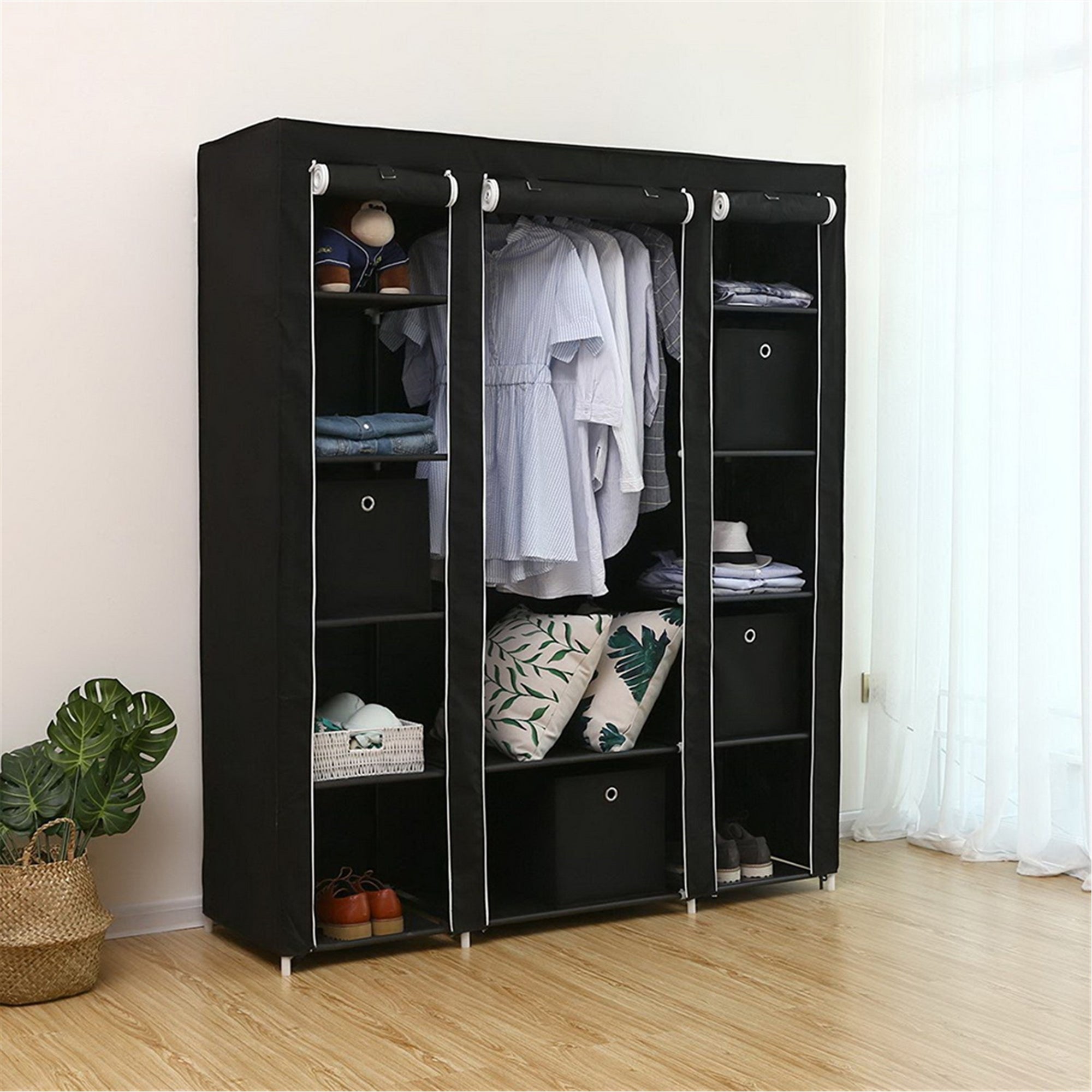 Furnipuzzle Portable wardrobe storage organizer. It has a metal hanging rack combined with non - woven fabric, perfect for the bedroom