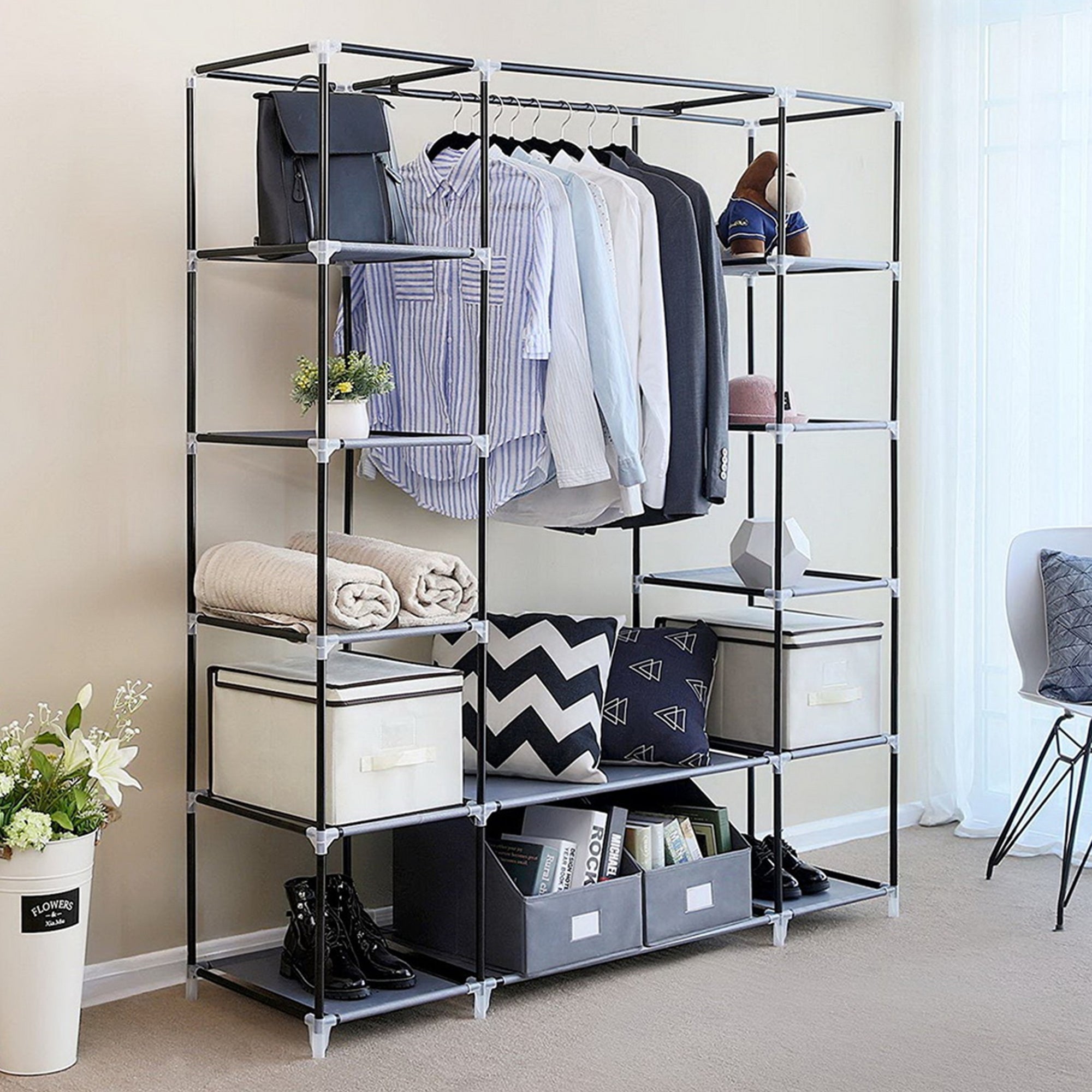 Furnipuzzle Portable wardrobe storage organizer. It has a metal hanging rack combined with non - woven fabric, perfect for the bedroom